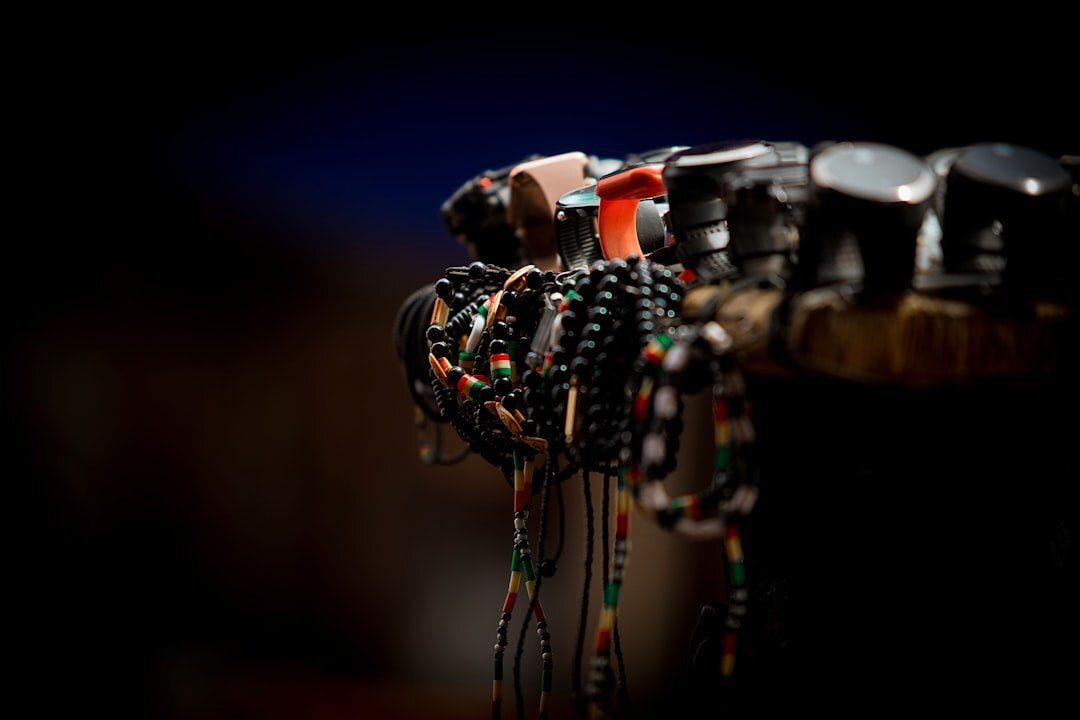 Futuristic metallic robot hand reaching upward on dark background
