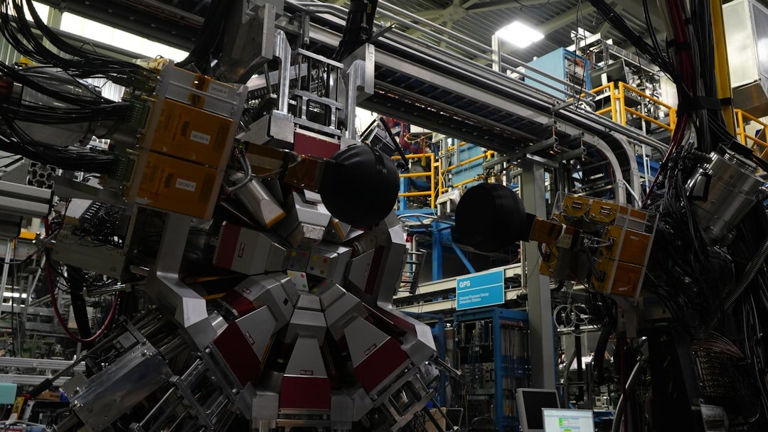 Industrial robotic arms in a modern automated factory assembly line